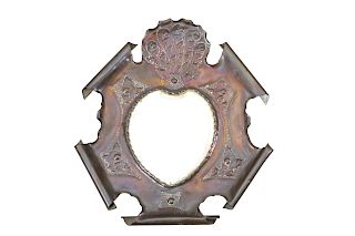 AN ARTS AND CRAFTS COPPER MIRROR, with shield-shaped mirror
