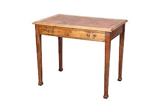 AN EDWARDIAN LEATHER-INSET WRITING TABLE, with frieze drawe
