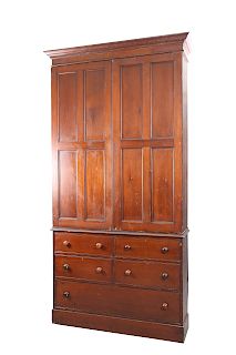 A VICTORIAN STAINED PINE ESTATE CUPBOARD, the projecting co