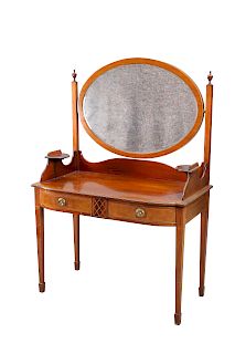 AN EDWARDIAN INLAID MAHOGANY DRESSING TABLE, with oval mirr
