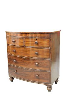 A VICTORIAN MAHOGANY BOW-FRONT CHEST OF DRAWERS, with two s