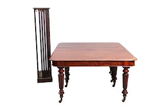 AN EARLY 19TH CENTURY MAHOGANY DINING TABLE, the ends with 