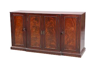 AN EARLY 19TH CENTURY MAHOGANY BREAKFRONT SIDE CABINET, wit