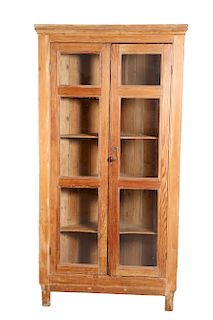 AN EARLY 19TH CENTURY PINE STANDING CORNER CABINET, with a 