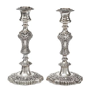 A silver couple of candle sticks 