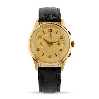 FOSTER - A 18K gold wristwatch, Foster
