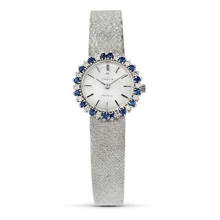 Omega - A 18K white gold, diamond and sapphire, lady's wristwatch, Omega