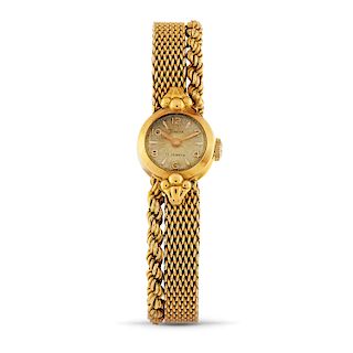 Timor - A 18K yellow gold lady's wristwatch, Timor
