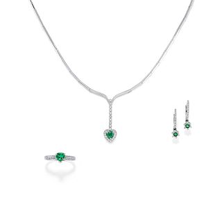 A 18K white gold diamond and emerald necklace, ring and earring