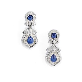 A 18K white gold, diamond and sapphire earring