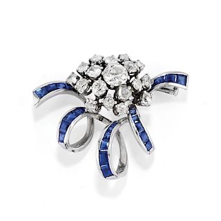 A 18K white gold, diamond and sapphire brooch