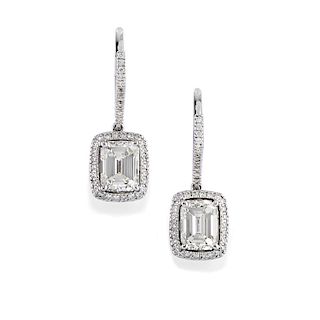 A 18K white gold and diamond earring
