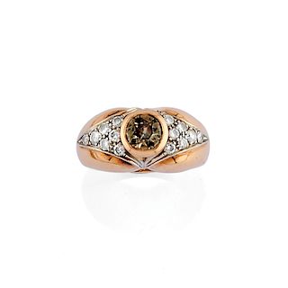 A two-color 18K gold and diamond ring