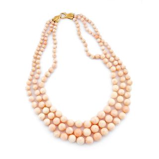 A 18K gold and rose coral necklace
