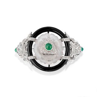 A 18K white gold, diamond, emerald and rock crystal brooch
