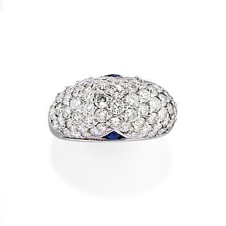 A 18K white gold, diamond and sapphire ring