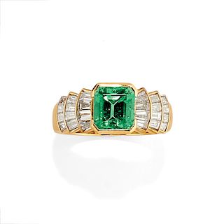 A 18K yellow gold, emerald and diamond ring