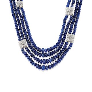 A 18K two color gold, sapphire and diamond necklace