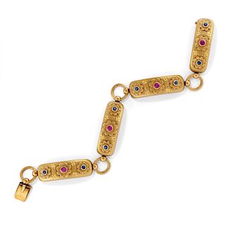 A 18K yellow gold, ruby and sapphire bracelet