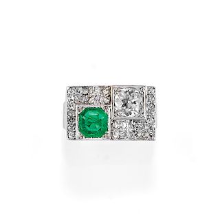 A platinum, diamond and emerald ring, circa 1930