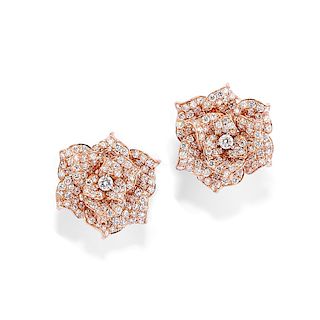 A 18K rose gold and diamond earring