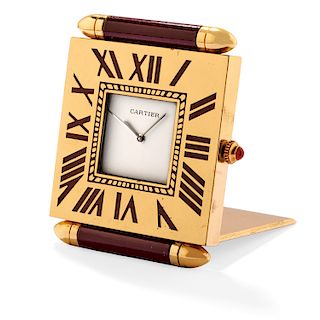 Cartier - A metal gilded table watch, Cartier
