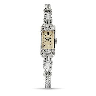 Longines - A 18K white gold lady wristwatch, Longines