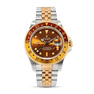 Rolex - A steel and 18k gold wristwatch, Rolex, GMT-MASTER II, Ref. 16713