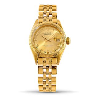 Rolex - A 18K gold lady's wristwatch, Rolex Date-Just, Ref. 6901