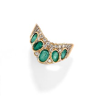 A 18K gold, emerald and diamond ring