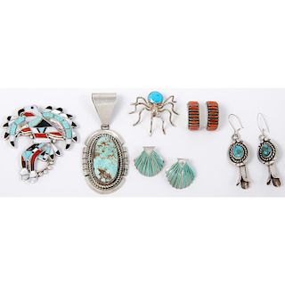 A Collection of Zuni and Navajo Earrings, Pendants, and Pins