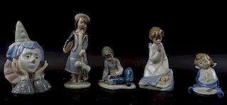 Collection of five Lladro porcelain figures.