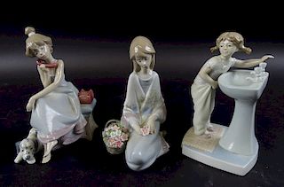 Collection of three lladro porcelain figures
