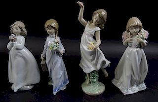 Collection of four Lladro porcelain figures