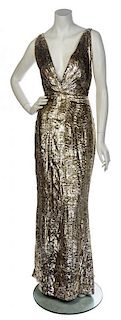 * A Christian Dior Metallic Gold Evening Gown, Size 42.