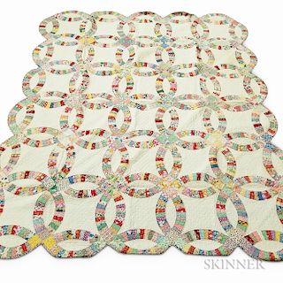 Four Patchwork Printed Cotton Quilts.  Estimate $400-600