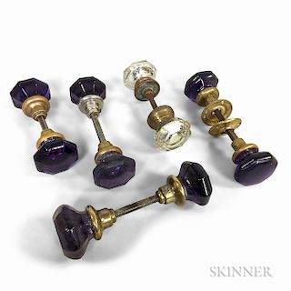 Five Sets of Mostly Amethyst Glass Doorknobs.  Estimate $100-150