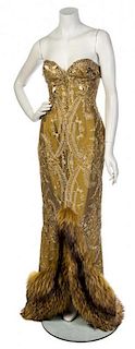 * A Lorenzo Riva Couture Gold Strapless Evening Gown,