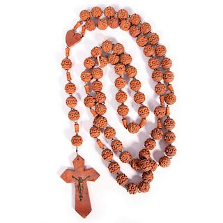 A carved wooden rosary.