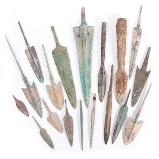 Eighteen ancient bronze arrow and spear points.