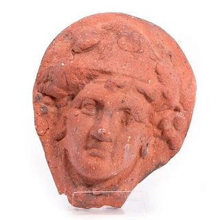 Ancient Etruscan terracotta head.