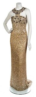 * An Oscar de la Renta Champagne Bead and Silk Tulle Gown, Size 6.