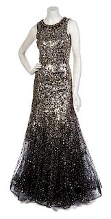 * An Oscar de la Renta Embroidered Black Tulle Sequin Gown, Size 6.