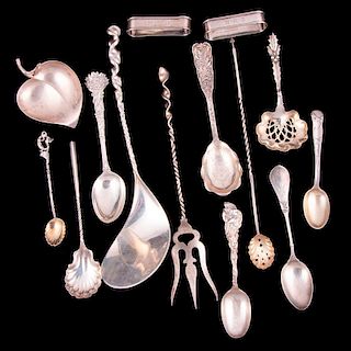 Fourteen sterling serving pieces.