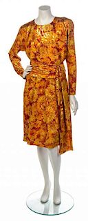 * An Yves Saint Laurent Orange Floral Dress, Size 40.