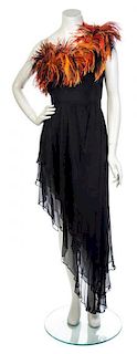 * An Yves Saint Laurent Single Shoulder Black Cocktail Dress, Size 38.