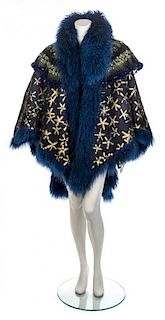* A Navy Suede and Mongolian Lamb Cape, No size.
