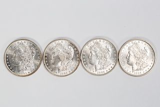 Four $1 Morgan Silver Dollar Coins, 1883, 84, 85