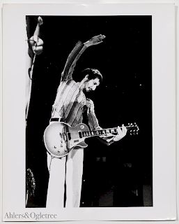 Michael Zagaris, "Strumming On His Guitar" Photo