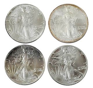 Four Rolls American Silver Eagles